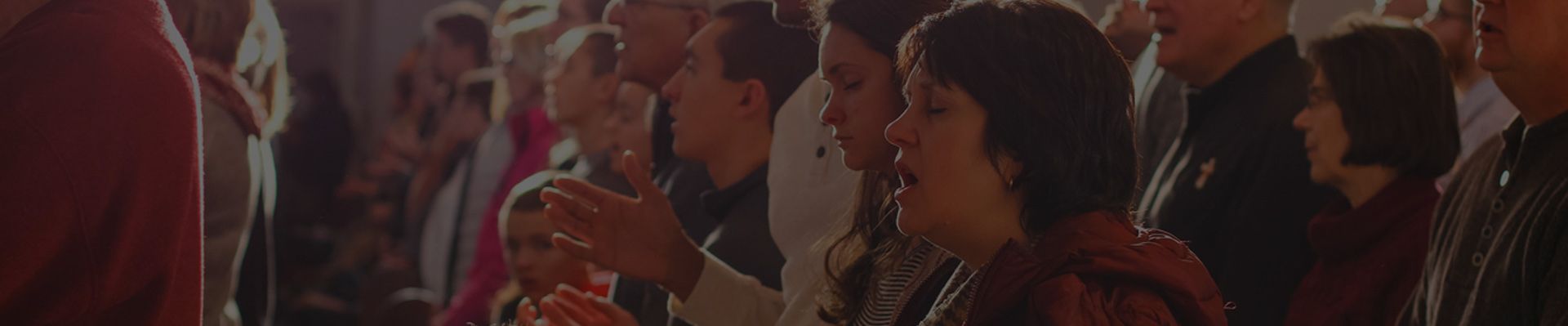 A group of people worshiping in church