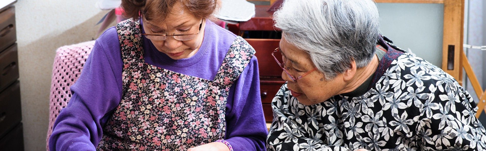 Two women sewing